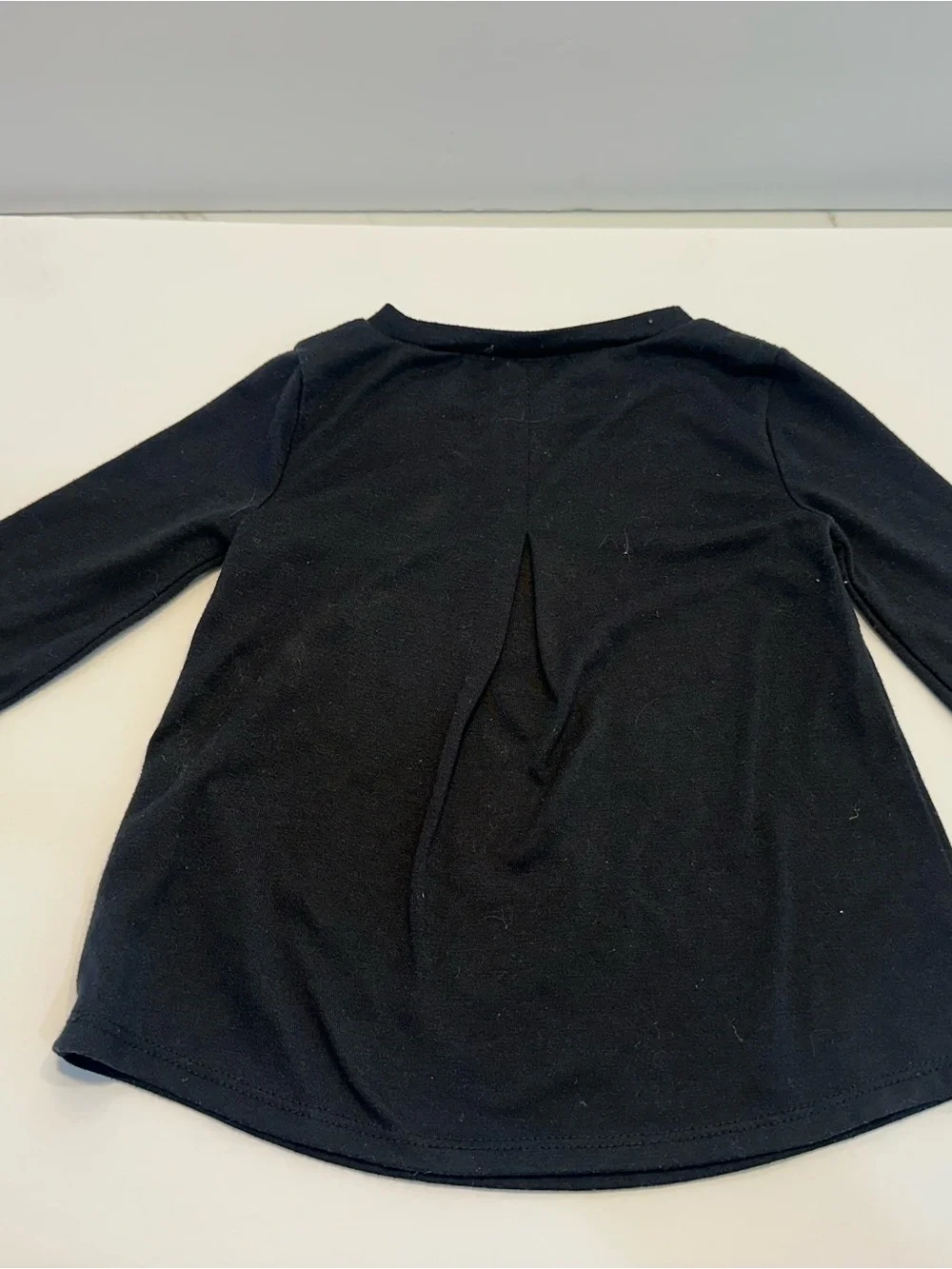 Nike Kid's Black Long Sleeve Tee with Gold Logo and Floral Swoosh